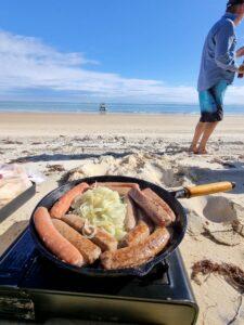 Sausage bbq, beach, perosnal injury